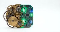 Vintage clockwork gears merged with modern green circuit board technology fusion concept isolated on white background for digital transformation designs.