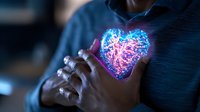 Glowing neon heart shape floating above hands in dark room creates magical atmosphere with blue and pink light effects, concept of love and energy healing.
