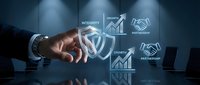 Businessman touching shield icon with growth chart and partnership symbols on digital interface representing business security and development strategy.