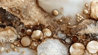 Abstract fluid art with golden, brown, and white bubbles creating organic marble-like texture on neutral background. Luxury aesthetic.