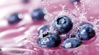 Fresh blueberries splashing in clear water with dynamic water drops and ripples against pink background. Macro food photography showing juicy berries in motion.