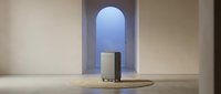 Minimalist modern interior with geometric archway and cylindrical pedestal display in neutral beige tones for contemporary design and architecture projects.