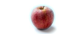 Red apple isolated on white background, fresh fruit for healthy eating, nutrition, and food design projects.