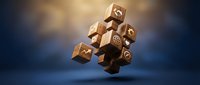 Wooden dice with symbols floating in mid-air against a blurred blue and gold background, representing chance, gaming, and decision-making concepts for business and entertainment applications.
