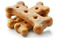 Natural dog bone treats isolated on white background for pet food packaging and veterinary nutrition marketing materials.