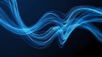 Glowing blue wave of light energy flowing across dark background, suitable for technology, science, and digital design projects.