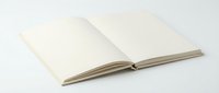 Open blank notebook with empty white pages on neutral background for writing, journaling, education and creative projects.