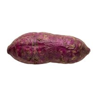 Raw purple sweet potato isolated on white background, ready for culinary and food design projects.