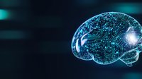 Glowing digital brain with circuit pattern visualization on dark background illustrates artificial intelligence and machine learning technology advancement.
