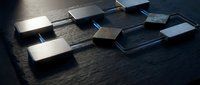 Scattered metallic rectangular blocks on dark textured surface with dramatic lighting creating shadows and reflections for modern design projects.