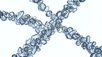 Transparent blue crystal beads arranged in an X shape against white background, suitable for jewelry design, fashion accessories, and decorative craft projects.