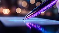 Glowing digital pen tip touching screen surface with purple and blue light reflection, bokeh background creates futuristic technology mood.