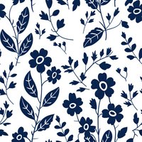 Navy blue floral seamless pattern with delicate flowers and leaves on white background. Repeating botanical design tiles continuously for fabric and wallpaper.