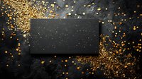 Black business card mockup with gold glitter and confetti on dark textured background for luxury branding presentation.