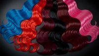 Colorful wavy hair strands in blue, red, brown and pink tones showcasing vibrant hair color options and styling possibilities for beauty salon services.