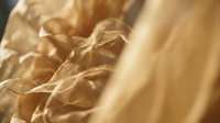 Dried wheat stalks and grain heads in close-up, showcasing golden-brown textures and natural agricultural details for harvest and farming concepts.