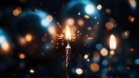 Glowing sparkler candle on dark background with magical bokeh lights and sparks creating festive celebration atmosphere. Perfect for holiday designs.