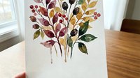 Watercolor autumn foliage bouquet with colorful leaves and berries in warm fall tones on white background, isolated for seasonal design projects.