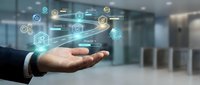 Businessman hand displaying floating digital technology icons and network connections in modern office environment for business innovation concepts.
