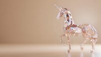 Crystal unicorn figurine with geometric facets standing elegantly against soft beige background, showcasing magical fantasy art for collectors.