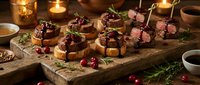 Gourmet beef tenderloin crostini with cranberries and herbs on rustic wooden board, perfect for holiday entertaining and festive appetizer presentations.