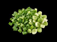 Chopped green onions and scallions isolated on transparent background, ready for culinary design, recipe graphics, cooking blogs, food packaging, restaurant menus, and print-on-demand kitchen products.