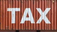 White TAX text painted on rusty red metal shipping container surface showing weathered industrial texture and corrugated pattern.