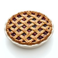 Homemade fruit pie with golden lattice crust and berry filling in ceramic dish, isolated on white background for bakery, recipe, and food design projects.