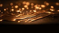 Abstract golden waves flowing with warm bokeh lights creating elegant luxury background for premium design projects and sophisticated branding materials.