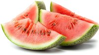 Fresh watermelon slices with vibrant red flesh and green rind, isolated on white background. Perfect for food, nutrition, summer beverage, and healthy eating designs.