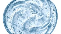 Transparent gel texture with water droplets and swirling liquid motion, isolated on white background for cosmetic, skincare, and beauty product packaging design.