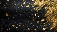 Golden glitter and sparkle particles scattered on black background with metallic powder texture creating luxurious festive decoration pattern.