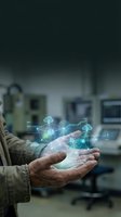 Engineer holding glowing digital network with cloud computing icons and data connections in laboratory setting for technology solutions.