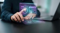 Businessman hand touching holographic interface with financial analytics, calculator, and data visualization icons for business technology and digital solutions.