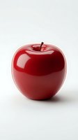 Glossy red apple with stem isolated on white background, suitable for health, nutrition, and food design projects.