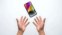 Hands of adult male with medium skin tone reaching upward toward smartphone displaying colorful gradient screen, isolated on white background for app promotion and technology marketing.