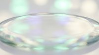 Abstract iridescent soap bubble surface with rainbow reflections and soft bokeh lights creating dreamy holographic texture for modern design projects.