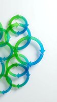 Circular arrows in green and blue gradient forming interconnected cycle pattern on white background for business process and workflow concepts.
