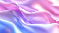 Smooth flowing silk fabric in pink and blue gradient colors creates elegant waves and folds with soft light effects and luxurious satin texture for fashion backgrounds.
