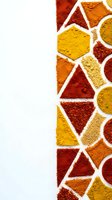 Colorful spice powder arranged in geometric shapes on white background with copy space for culinary design and cooking projects.