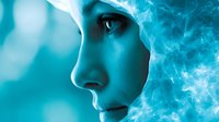 Young woman profile view in turquoise tones with mystical smoke effects creating dreamy atmospheric mood, artistic portrait highlighting facial features and ethereal ambiance.
