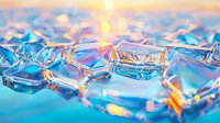 Crystal clear ice cubes with vibrant blue and orange light reflections creating magical prismatic effects against soft sunset background, macro photography.