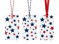 Patriotic star pattern gift tags with coordinating ribbons, featuring red, white and navy stars in varying sizes. Isolated on white background, ready for holiday wrapping, greeting cards, scrapbooking and craft projects.