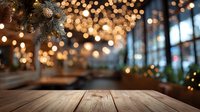 Wooden table with festive holiday background of blurred Christmas lights and decorations, creating warm ambiance for seasonal displays.