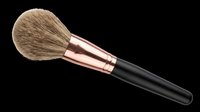 Makeup powder brush with rose gold ferrule and black handle, isolated on transparent background. Ready for beauty clipart, stickers, t-shirt design, and print on demand.
