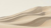 Smooth sand dunes with flowing curves and soft shadows, creating an abstract desert landscape. Suitable for backgrounds, travel designs, and nature-themed projects.