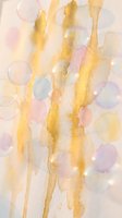 Abstract watercolor background with golden yellow brushstrokes and soft pastel circles creating dreamy artistic texture for creative projects.