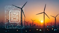 Digital energy management system with wind turbines at sunset showcasing renewable power technology and smart grid innovation for sustainable electricity generation.