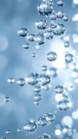 Sparkling water bubbles rising through clear blue liquid with glowing bokeh and light reflections, evoking freshness, purity, and hydration.