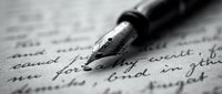 Fountain pen nib resting on handwritten cursive text, capturing the art of writing and correspondence for literature, education, and creative projects.